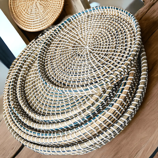 Gia Roma Seagrass Trays hand-woven natural with blue accents, six nested circular trays on Tampa Home & Garden Store