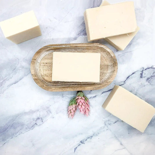 Pearberry fragrance soap bars, ivory blocks on a rustic wooden tray atop marble background on Tampa Home & Garden Store