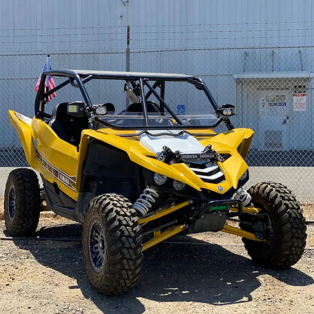 GP20 pod light bundle with wiring harness installed on yellow Yamaha off-road UTV on Tampa Home & Garden Store