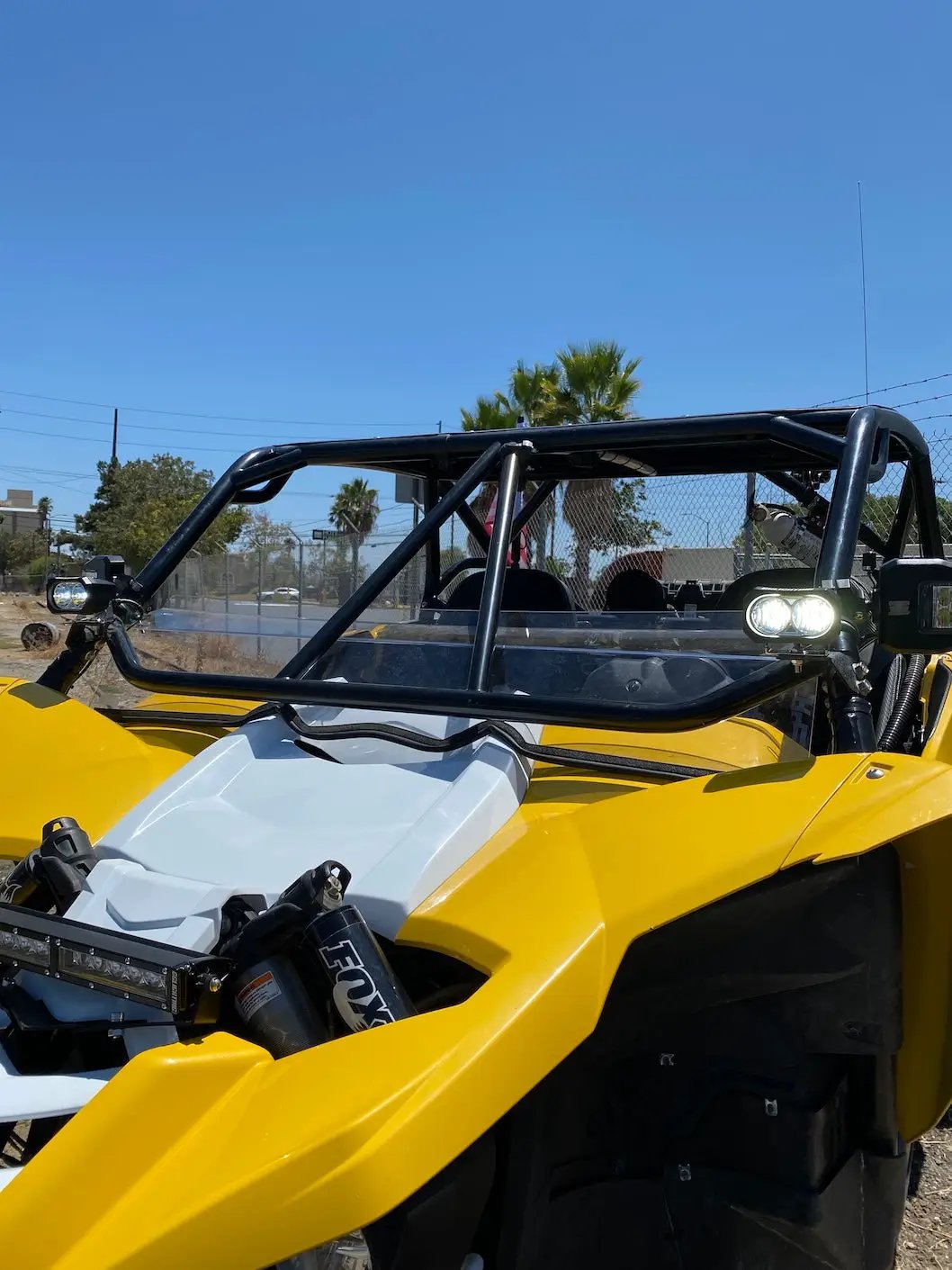 GP20 LED Pod Pair driving lights flood beam mounted on a yellow UTV with black roll cage on Tampa Home & Garden Store