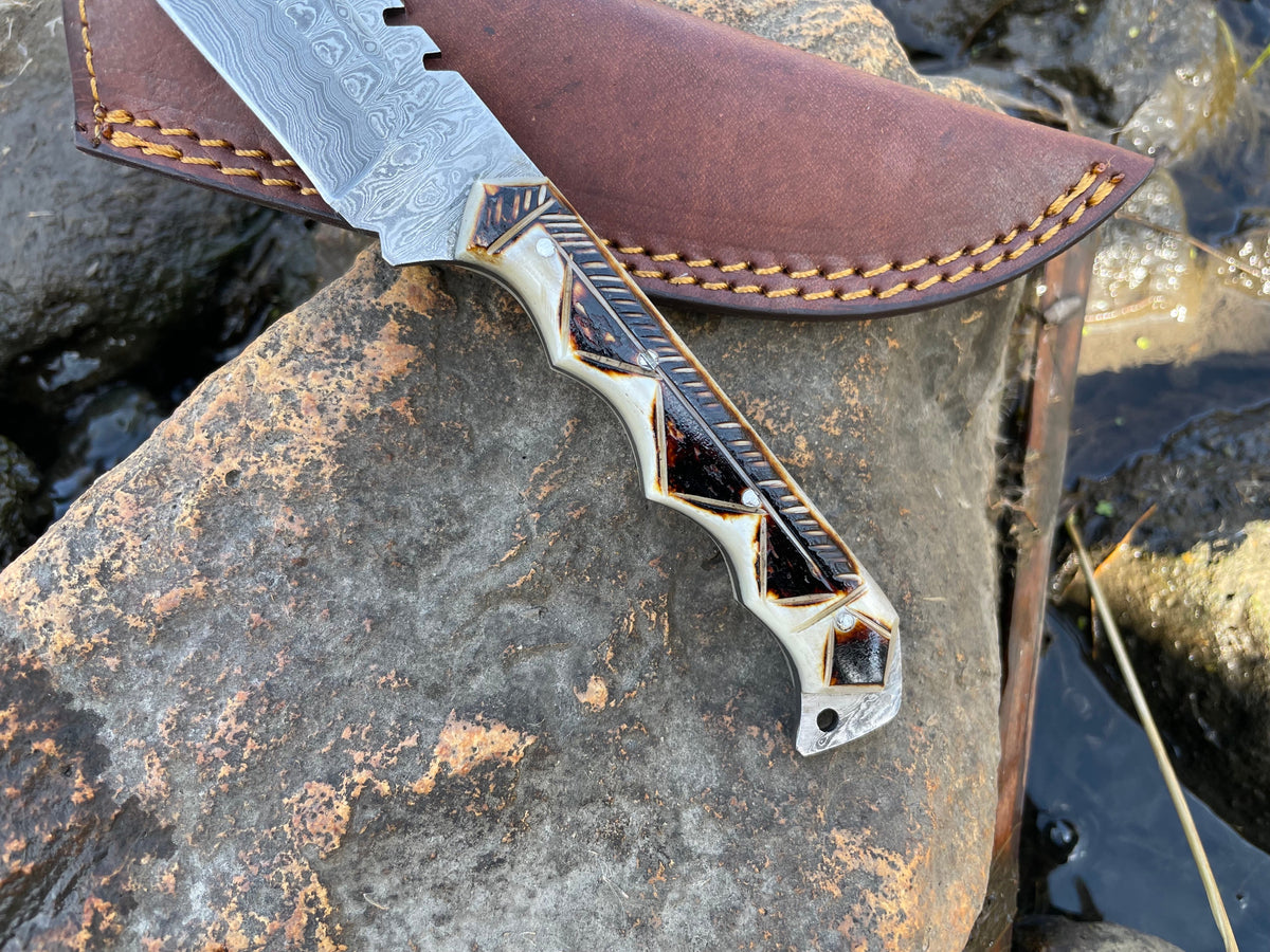 Damascus hunting knife with antler-inlay handle and serrated TK-032 Titan Int'l K leather sheath on Tampa Home & Garden Store