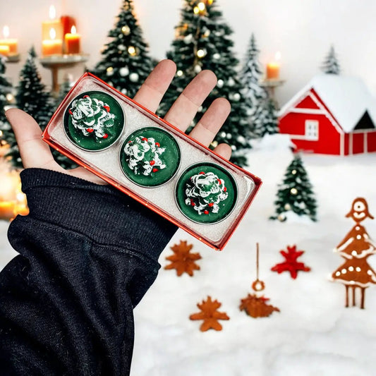 Unscented Green Christmas Tree Candle Trio in a red gift box with three round green tins on Tampa Home & Garden Store