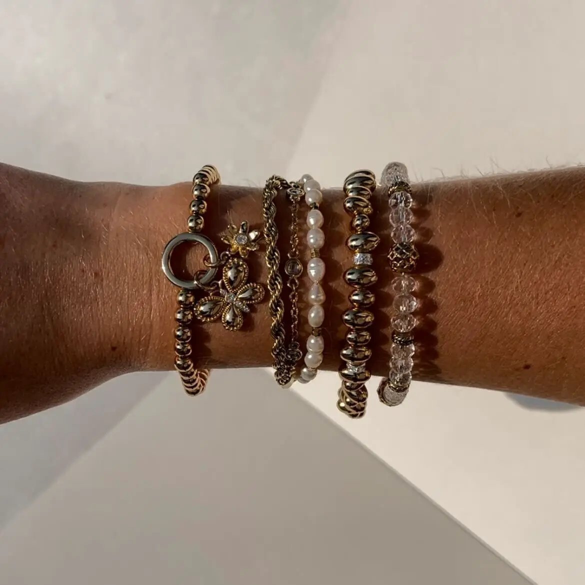 Puffy Butterfly Stretch Bracelet stack with gold-tone beads, pearls, and a butterfly charm on Tampa Home & Garden Store