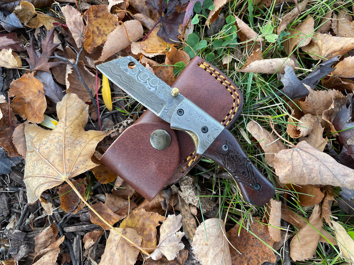 Damascus steel folding knife TF-083 by Titan K with swirled blade, brown leather sheath on Tampa Home & Garden Store