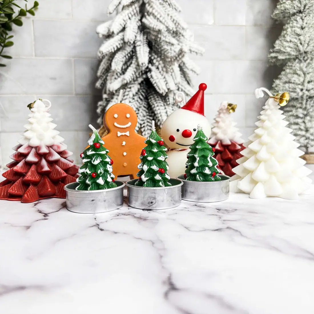 Unscented Green Christmas Tree Candle Trio; three green tree candles in metal tins on Tampa Home & Garden Store