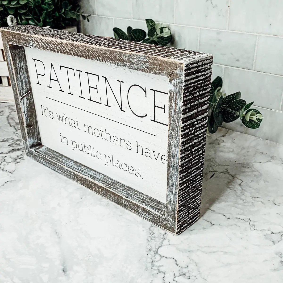 Patience and Mothers wooden framed sign with distressed whitewashed frame and white panel decorative plaque on Tampa Home & Garden Store