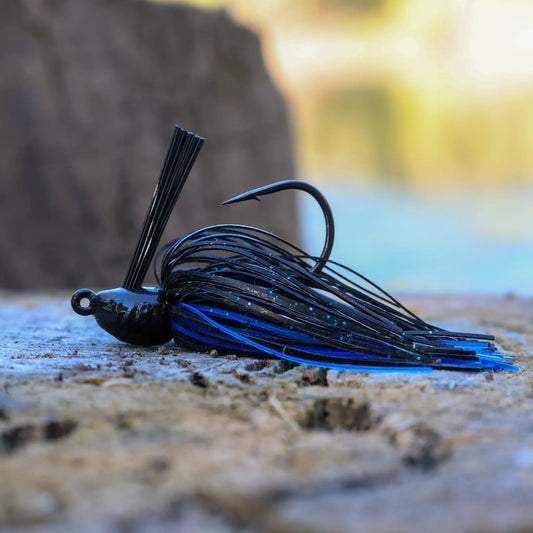 Reaction Tackle lead swim jig for bass with black blue speckled silicone skirts on Tampa Home & Garden Store