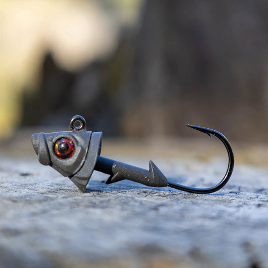 Reaction Tackle 97 Percent Pure Tungsten Swimbait jig head with red eye detail on a fishing rig on Tampa Home & Garden Store