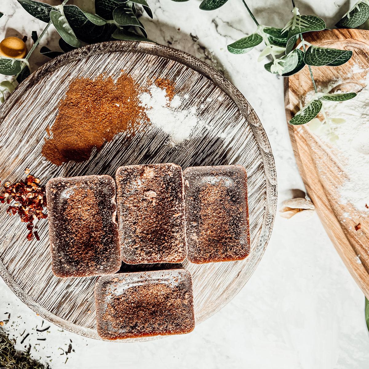 Gia Roma Gingerbread Latte XL wax melts, 4 tarts with cinnamon sugar dusting on rustic tray on Tampa Home & Garden Store