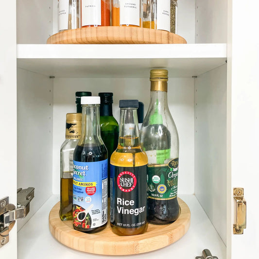 Bamboo Lazy Susan turntable for cabinets with spice jars and bottles on Tampa Home & Garden Store