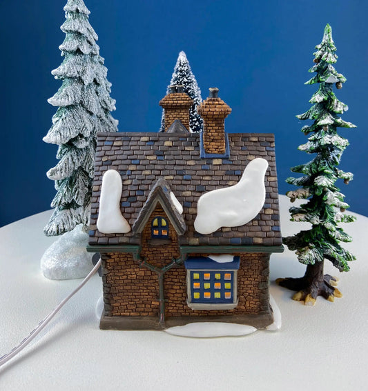 Illuminated Christmas Village Barmby Moor Cottage with snow roof, brick walls, lit windows on Tampa Home & Garden Store