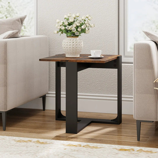 Industrial end table with wood top and black metal frame between beige sofas, topped with lattice vase and roses on Tampa Home & Garden Store