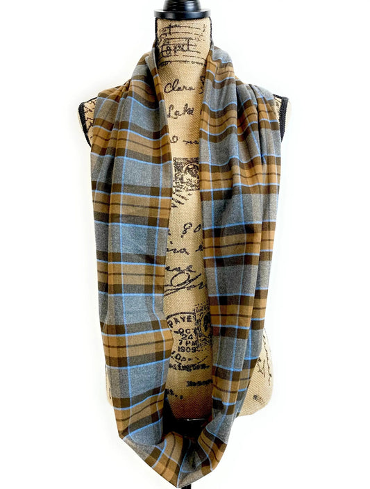 Infinity scarf in gray plaid flannel with blue/brown stripes, displayed on mannequin on Tampa Home & Garden Store