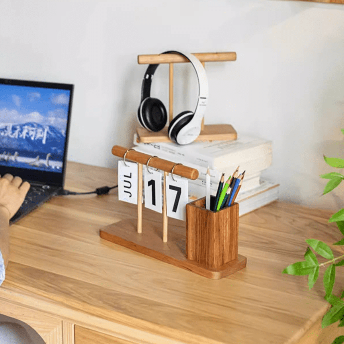 Wooden desktop calendar with pen holder in natural finish; JUL 17 blocks, pencil cup on desk on Tampa Home & Garden Store
