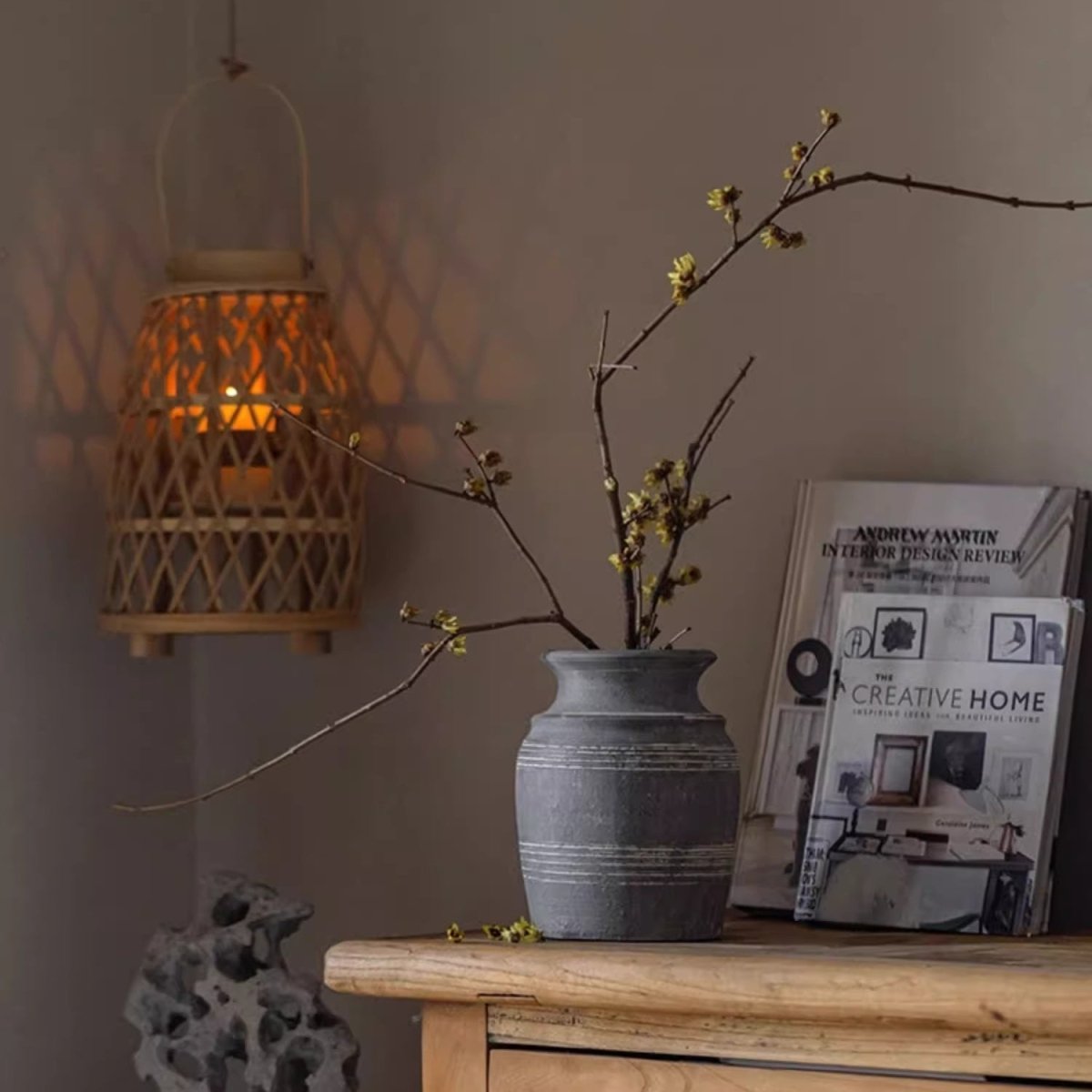 Handmade gray clay pottery vase by RusticReach with subtle horizontal bands on a wooden surface on Tampa Home & Garden Store