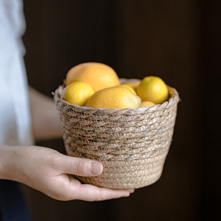 Natural Straw Desktop Flower Basket with woven texture, RusticReach, lemon-filled desk decor on Tampa Home & Garden Store