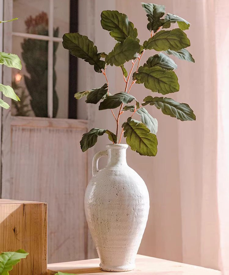 Wild Garden greenery stem 36 tall in a white ceramic vase with large green leaves on Tampa Home & Garden Store