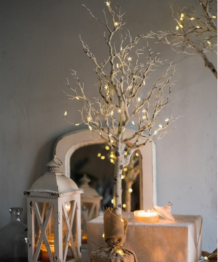 Christmas Withered White Christmas Tree Faux with warm fairy lights and burlap-wrapped base on Tampa Home & Garden Store