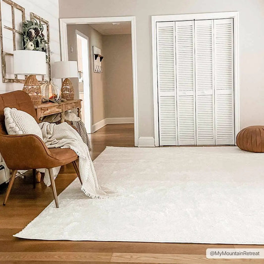 Judy White Washable Area Rug Clearance by Boutique Rugs, white shag in cozy living room on Tampa Home & Garden Store