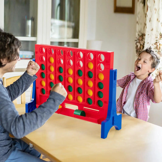 Jumbo 4-to-Score Connect game set with red board, blue stand, and green/yellow discs in play on Tampa Home & Garden Store