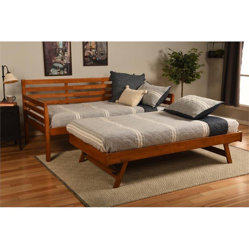 Cama de día con estructura de madera maciza con cama nido extraíble elevable en marrón medio