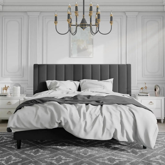 King size black velvet upholstered platform bed with tall headboard in a stylish bedroom on Tampa Home & Garden Store