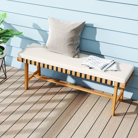 Acacia wood outdoor bench with thick beige cushion and large pillow on Tampa Home & Garden Store