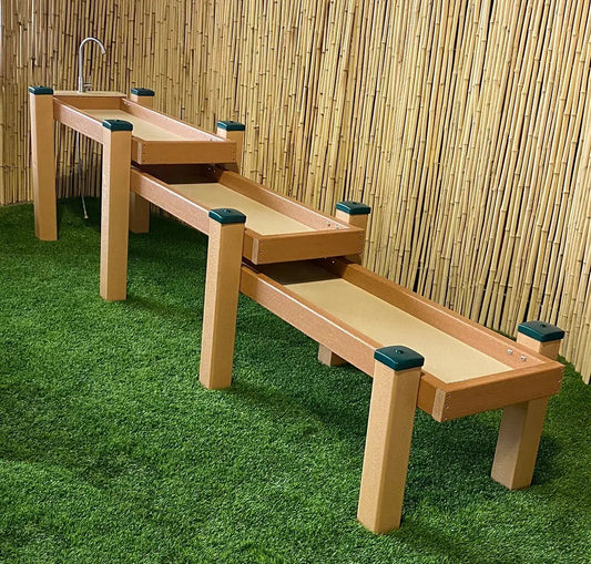 Kids Station outdoor sand and water trough with wooden frame and faucet on turf on Tampa Home & Garden Store
