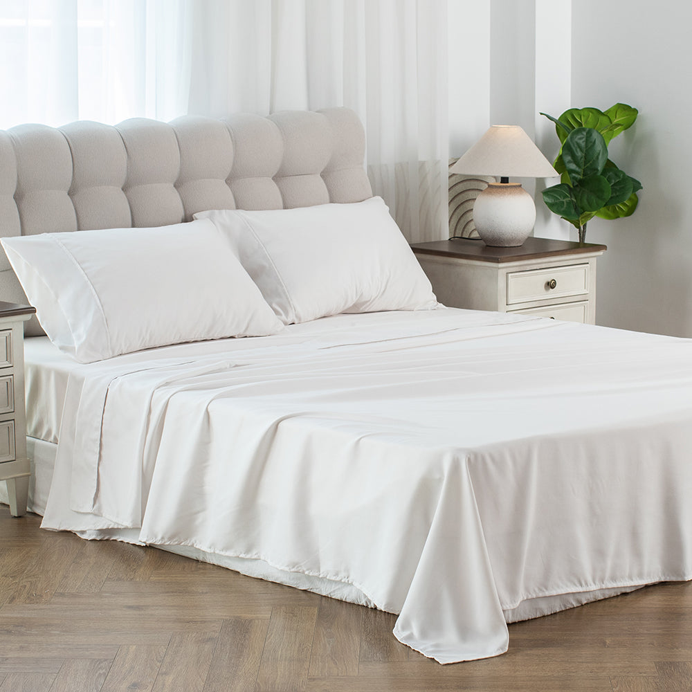 Kasentex Bedding Sheet Set with Deep Pocket white on bed with two pillowcases and headboard on Tampa Home & Garden Store