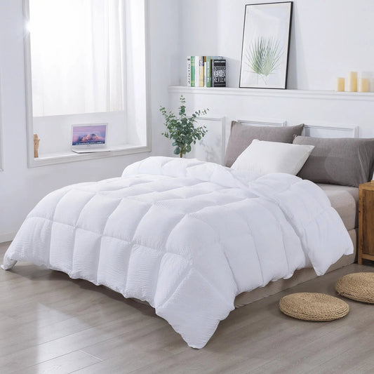 Kasentex All Season Down Alternative Comforter white quilted cover on bed in bright room on Tampa Home & Garden Store