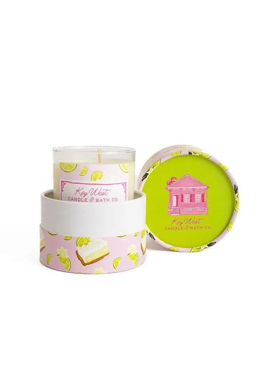 Key Lime Pie candle by Key West Candle & Bath Co. pink wrap with lime slice art, white holder on Tampa Home & Garden Store