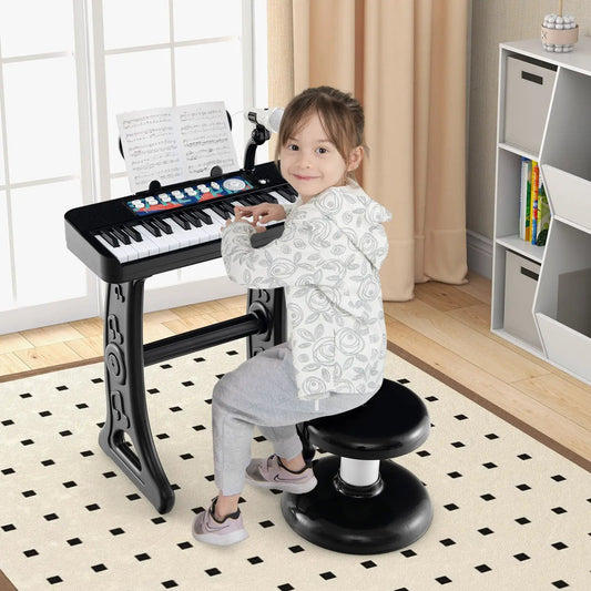 Kids 37-key piano keyboard toy with microphone and sheet music stand, child playing on Tampa Home & Garden Store
