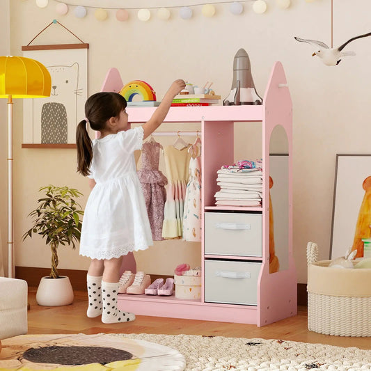 Pink kids play armoire dresser with cloth hanger, storage drawers and folded outfits on Tampa Home & Garden Store