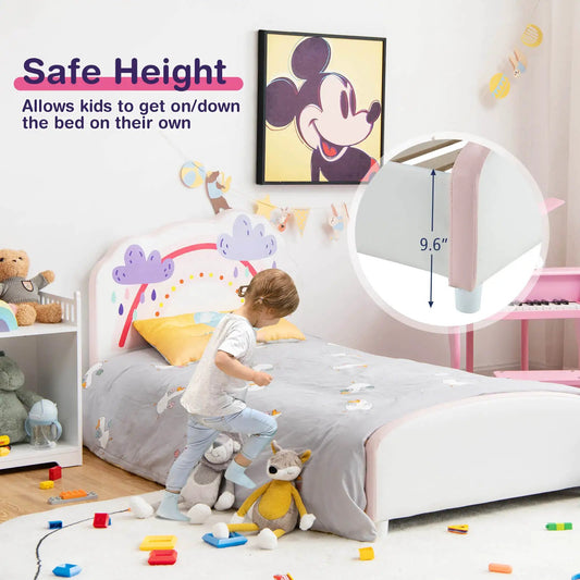 Kids twin platform bed with rainbow pattern upholstery and pink padded rails in a kids room on Tampa Home & Garden Store