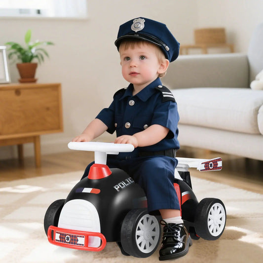 Kids ride-on police car with steering wheel; toddler in police uniform rides indoors on Tampa Home & Garden Store