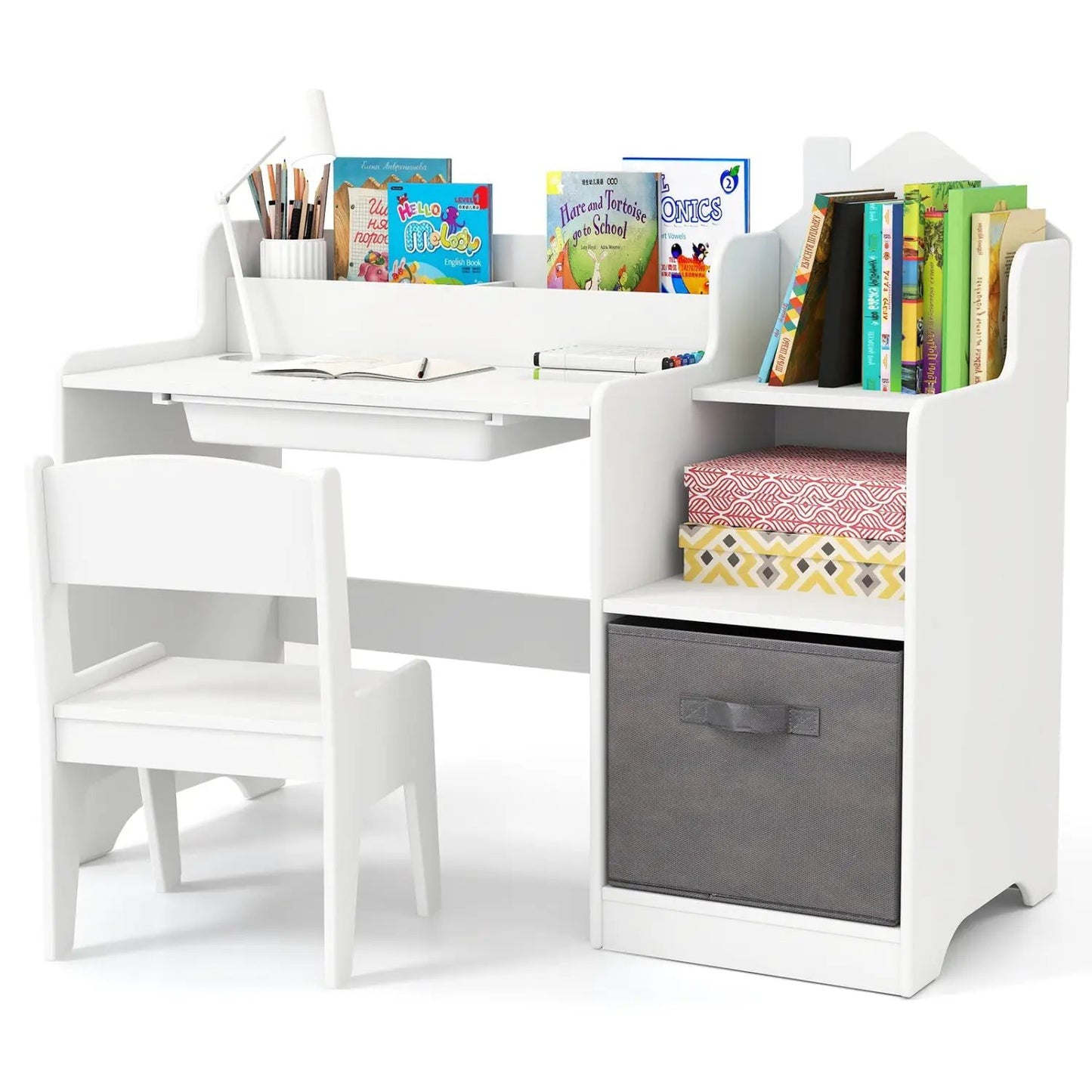 White kids study desk and chair set with open shelves, fabric storage bin, and books on Tampa Home & Garden Store