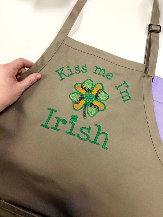 Kiss Me I'm Irish Embroidered Apron beige canvas with green text and shamrock design on Tampa Home & Garden Store