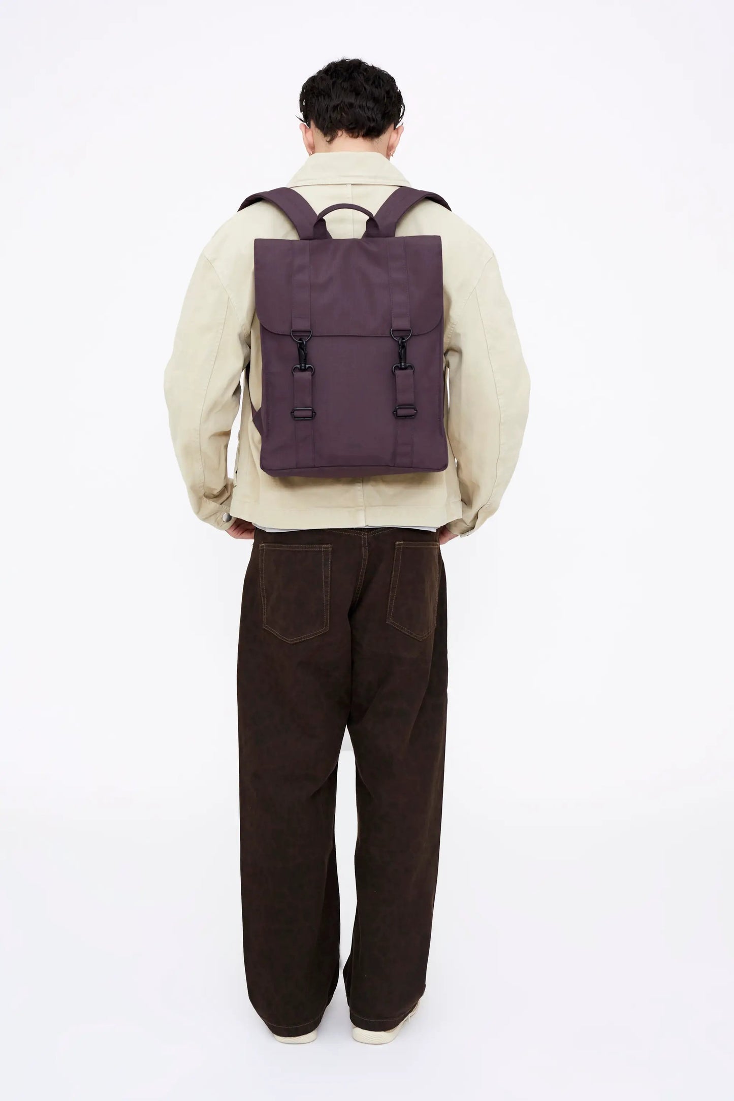 Handy XL backpack with laptop sleeve in purple by Lefrik USA, front flap with buckle straps on Tampa Home & Garden Store