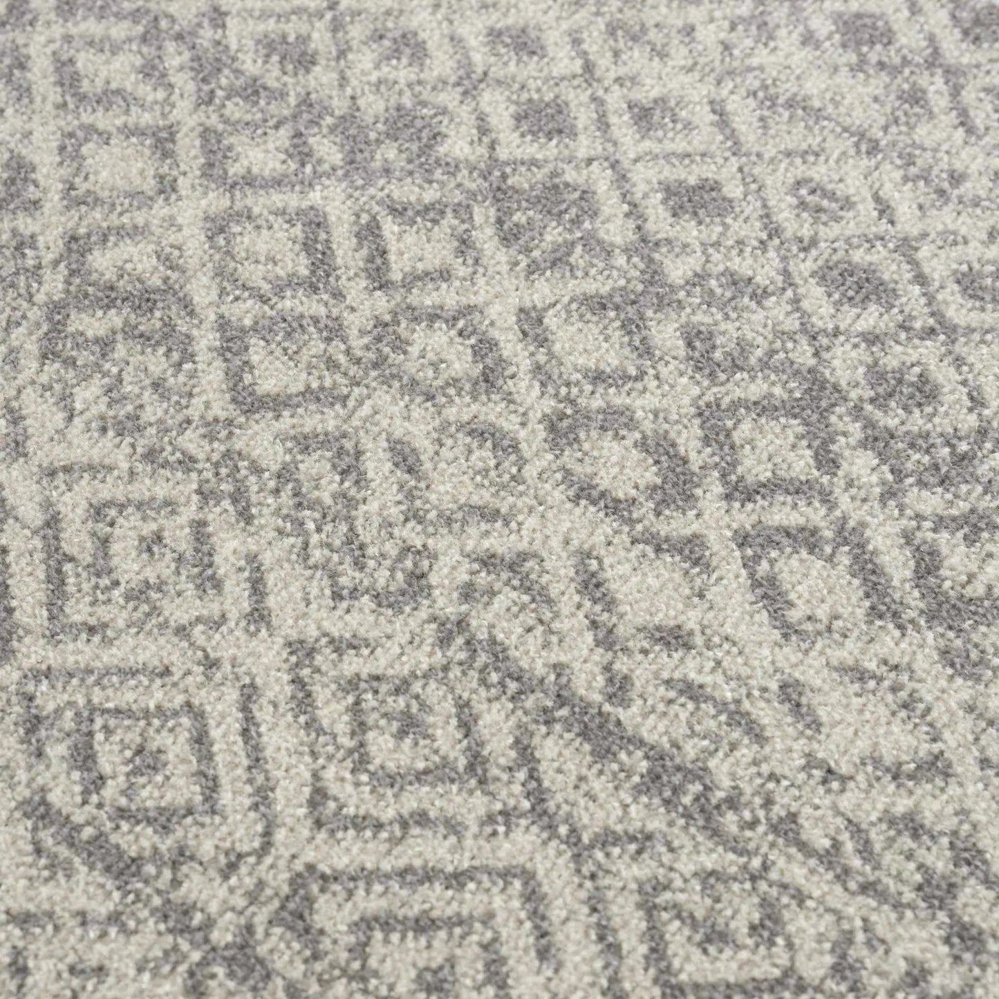 Gravelbourg washable boho rug gray by Boutique Rugs with gray ivory mottled pattern on Tampa Home & Garden Store