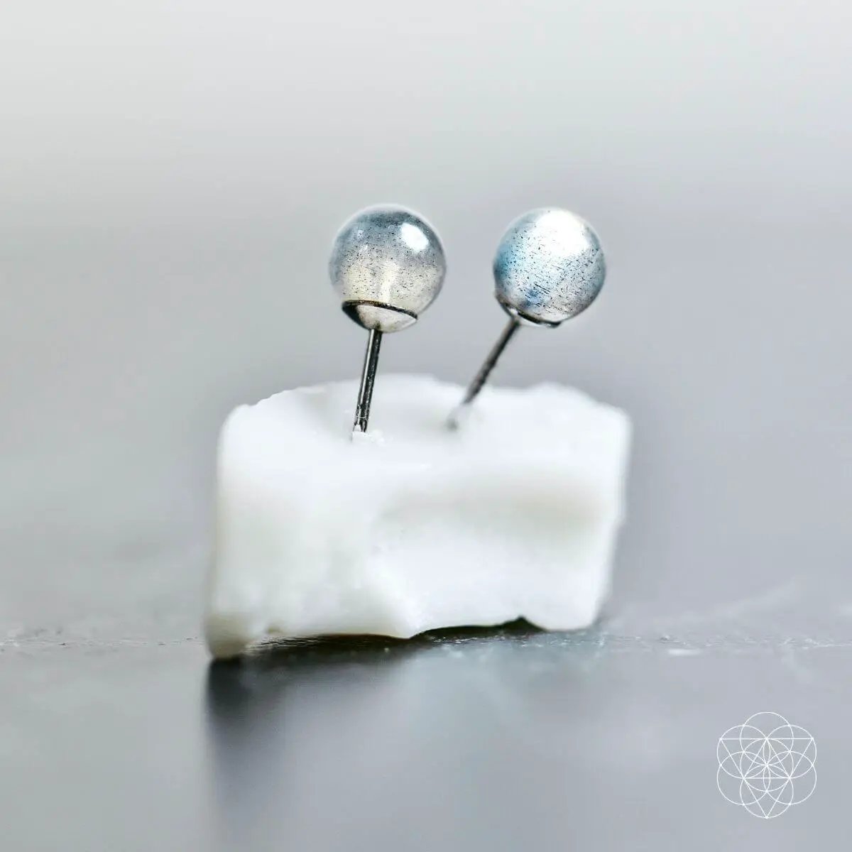 Labradorite Stabilization Earrings pair with silver-tone posts and round labradorite spheres on Tampa Home & Garden Store