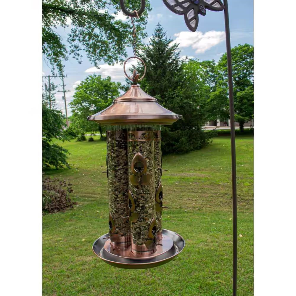 Large copper bird feeder with 3 tubes and 9 ports, copper finish, round feeding tray outdoors on Tampa Home & Garden Store