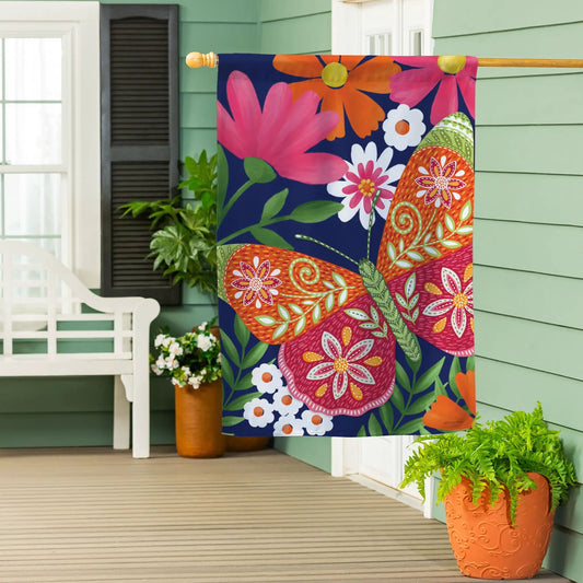 Bloom and Burst Butterfly Suede House Flag with vibrant floral print on navy backdrop on Tampa Home & Garden Store