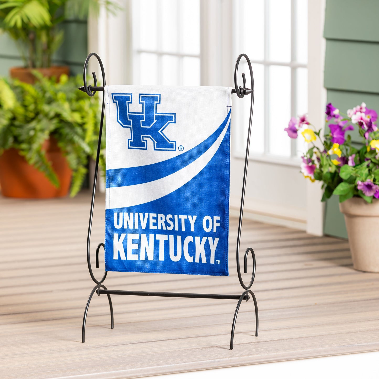 University of Kentucky burlap garden flag in blue and white with UK monogram on metal stand on Tampa Home & Garden Store