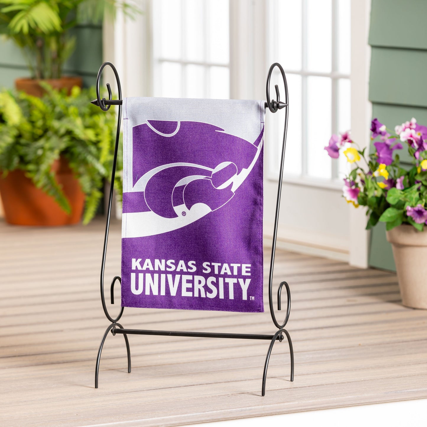 Kansas State University burlap garden flag in purple and white on metal stand on Tampa Home & Garden Store