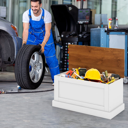 Large storage chest with safety metal hinge, white with wood top in a workshop on Tampa Home & Garden Store