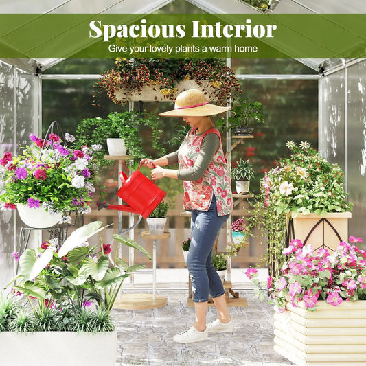 Large walk-in greenhouse with polycarbonate panels, lush potted plants, person watering flowers on Tampa Home & Garden Store
