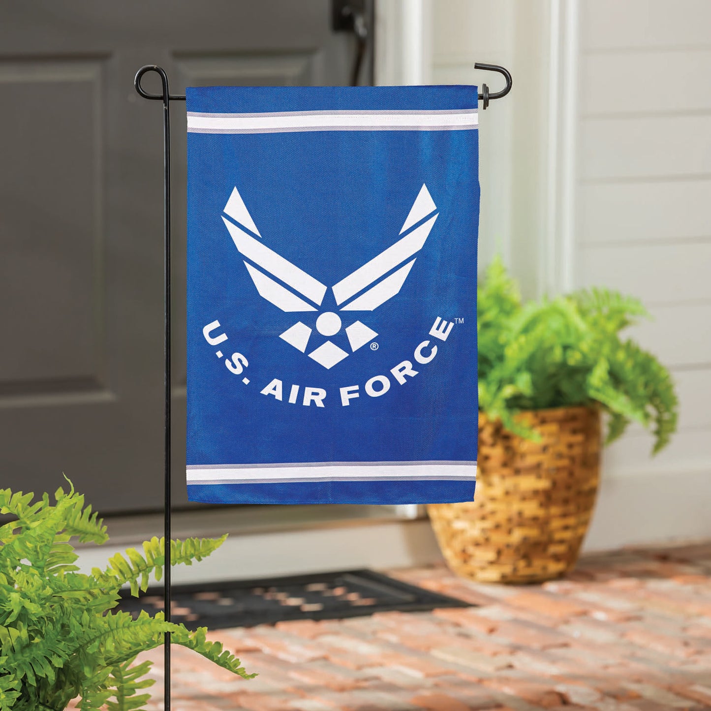 Blue embossed suede flag with Air Force emblem, garden flag on a metal stand on Tampa Home & Garden Store