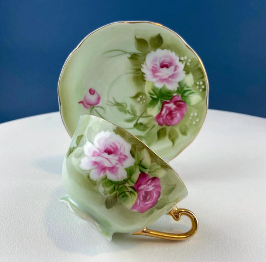 Lefton hand-painted tea cup and saucer, pale green with pink rose motif and gold rims, 2-piece on Tampa Home & Garden Store