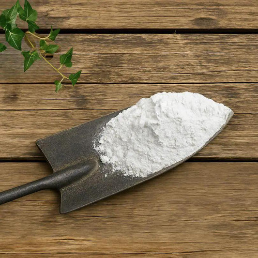 Limestone Microna Ag H2O soil amendment powder in a shovel on wood table on Tampa Home & Garden Store