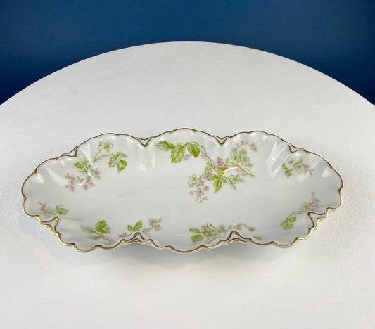 Limoges porcelain oval serving platter with wild roses motif, scalloped edges, gold rim on Tampa Home & Garden Store